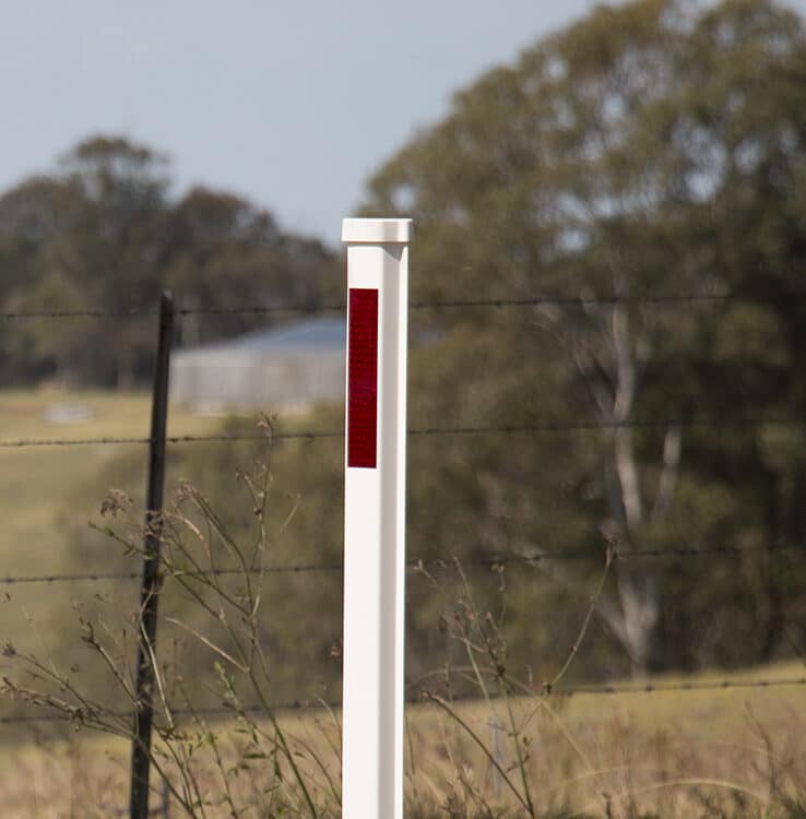 A red tipped semi rigid guide post in Australia