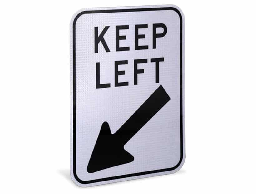 A reflective keep left sign