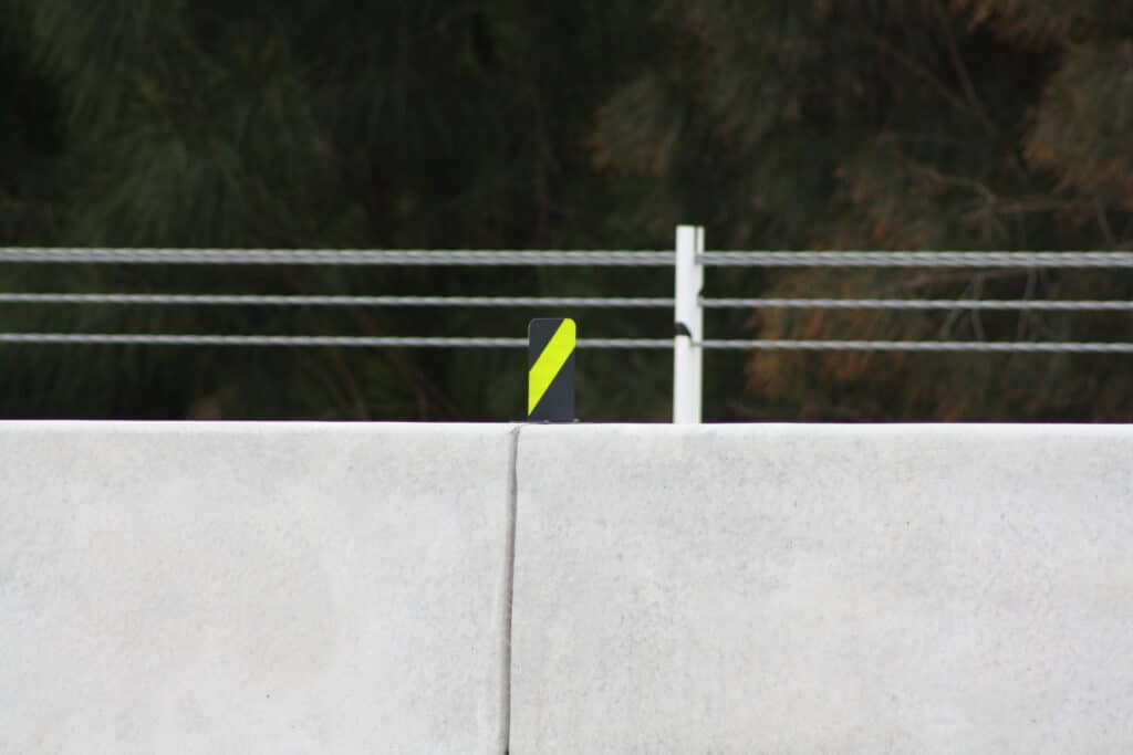 Black and yellow reflective barrier delineators