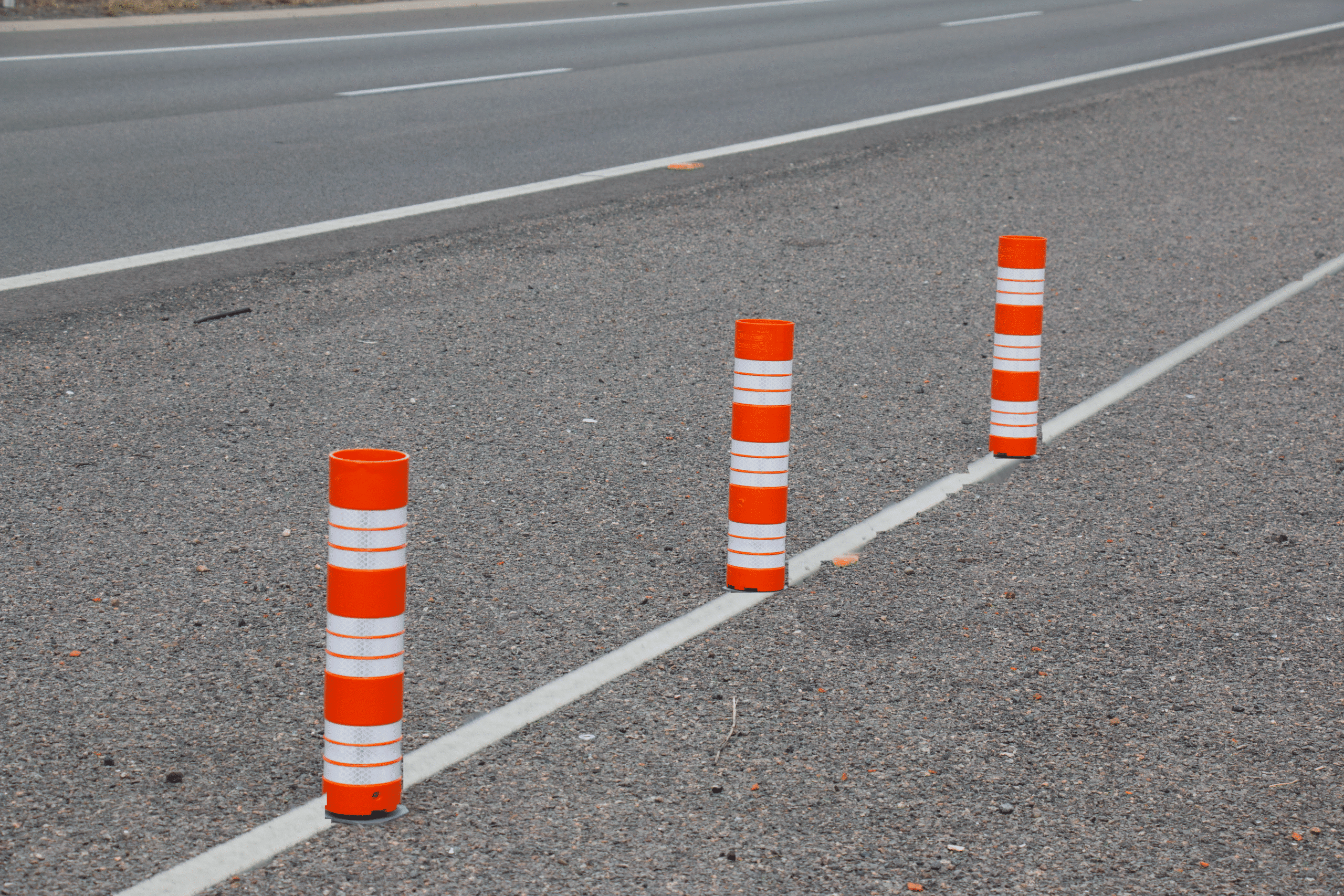 Orange lane-Flex pro markers installed on a road