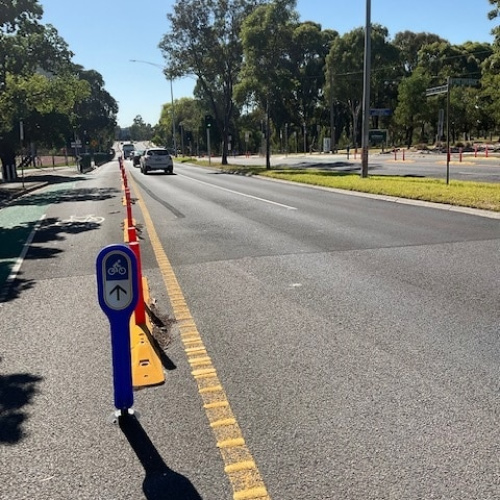 Lane-Flex Insitu 1 Laneflex bollards on the side of a bike lane