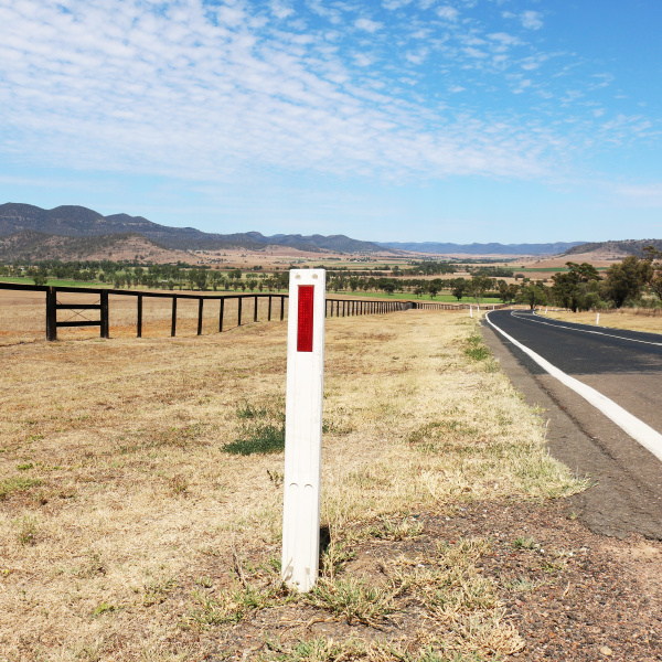 flexi-360-pro Red and white reflective road marker on a road